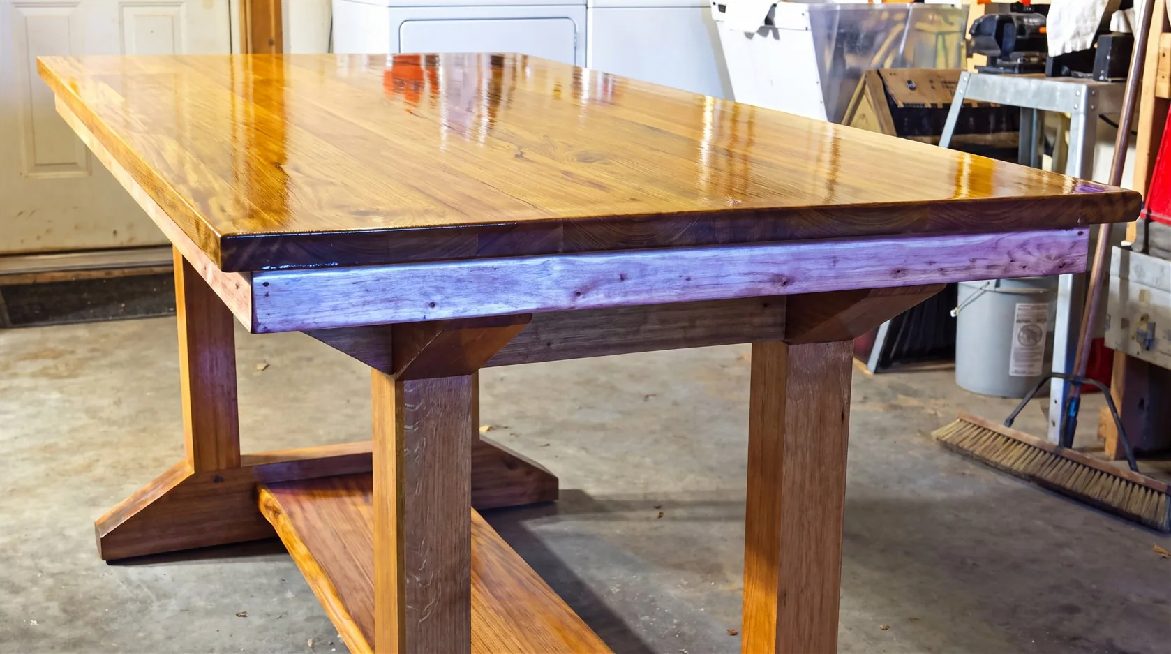 Dining table with restored natural wood surface and protective finish