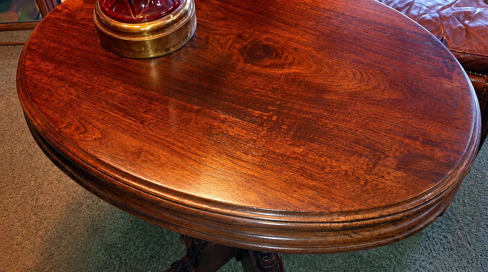 Occasional table with renewed wood finish after restoration
